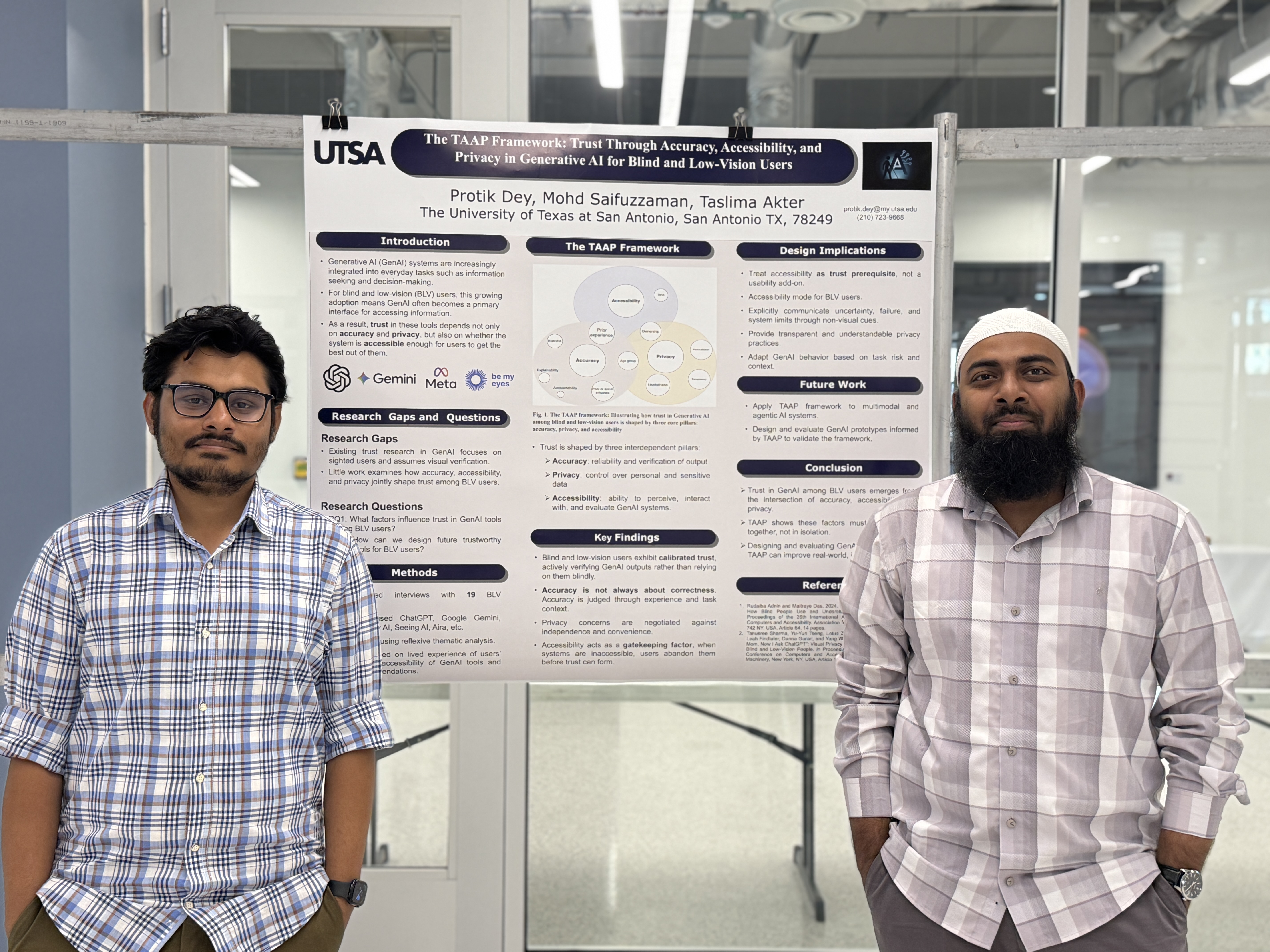Protik and Saif presenting poster
